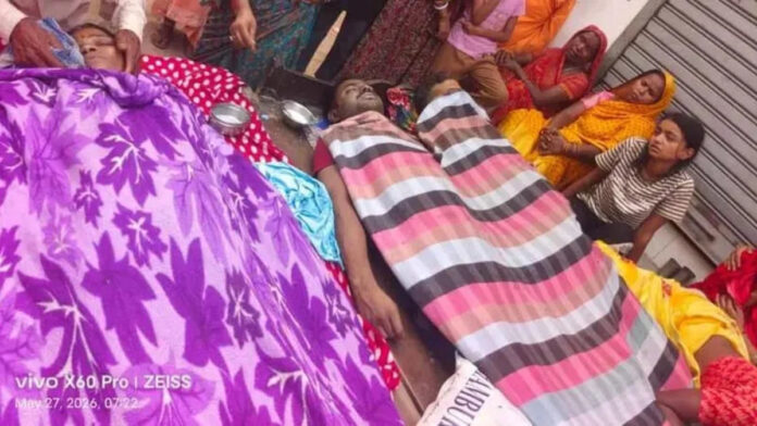 Police and villagers at incident site after three family members died from gas exposure in Hazaribag