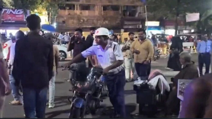 Jamshedpur Traffic Police Mega Checking Drive Traffic police conducting vehicle checking at a busy intersection in Jamshedpur